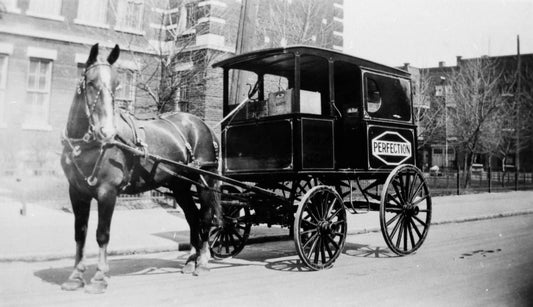 Cheval et voiture de livraison